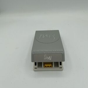 Paper punch tool that says Mrs.